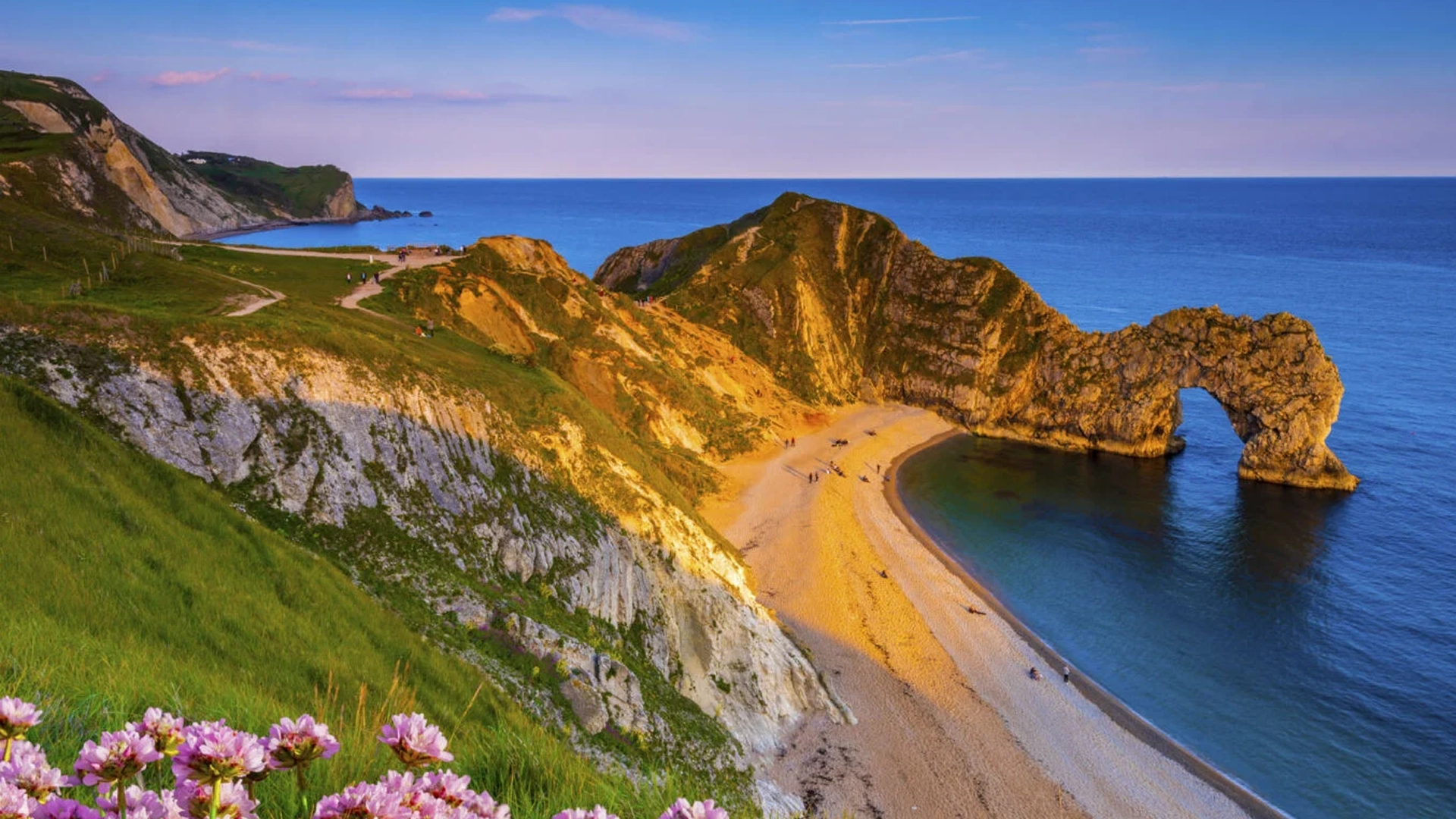 This private guided taxi tour perfectly showcases the breathtaking beauty and history of England's only natural World Heritage Site - the Jurassic Coast. We'll explore famous landmarks like Durdle Door's iconic limestone arch, Lulworth Cove�s turquoise waters, the ruins of Corfe Castle, and the vintage charm of Swanage town.
